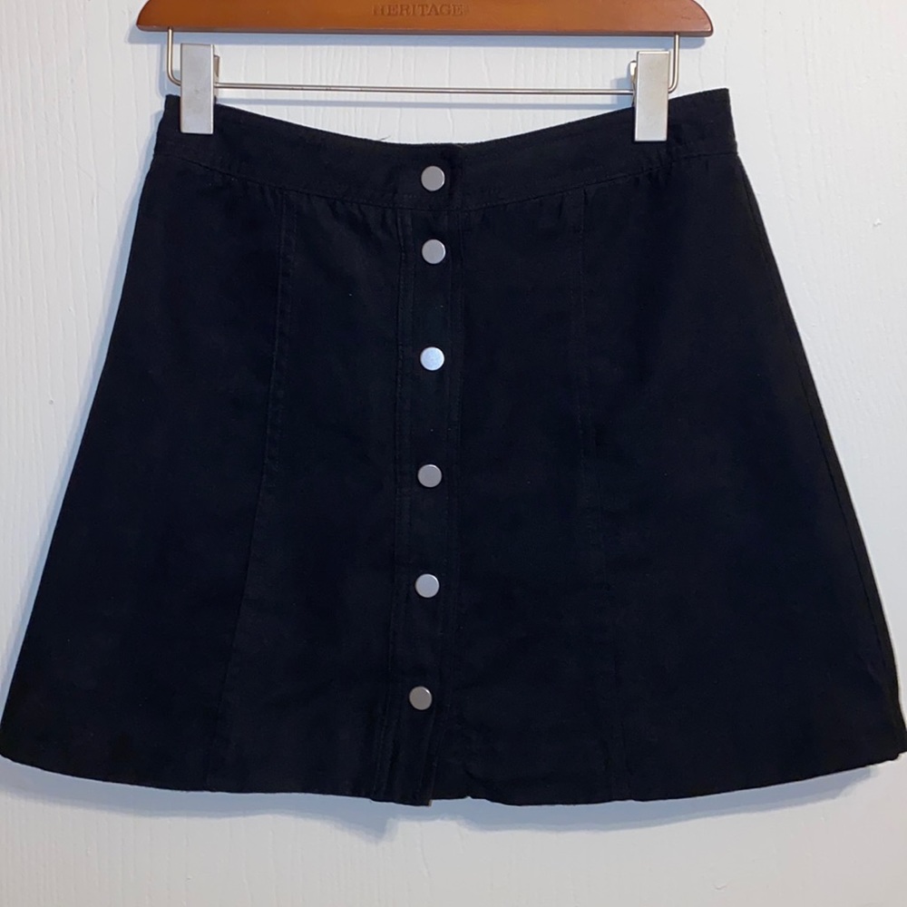 H&M black polyester skirt with button down . Size 6